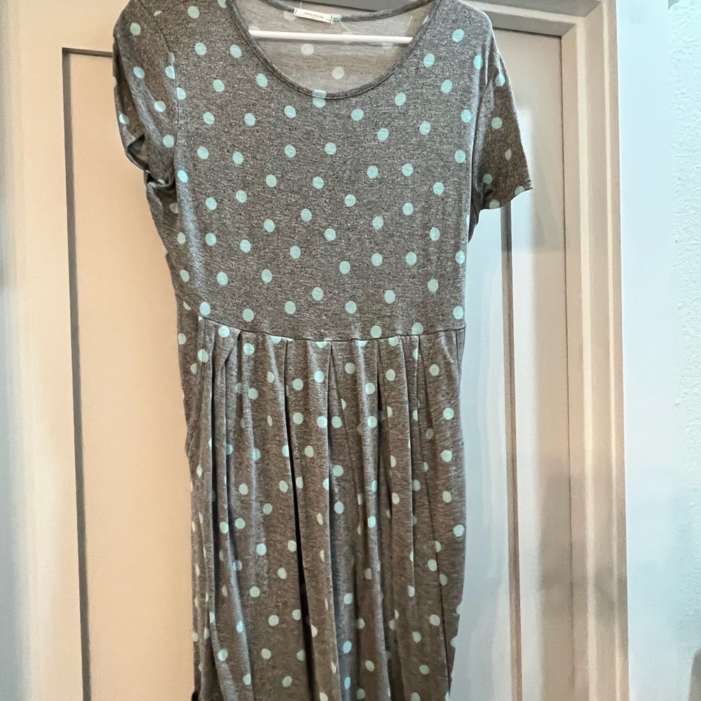 Classic work or play dress with pockets!